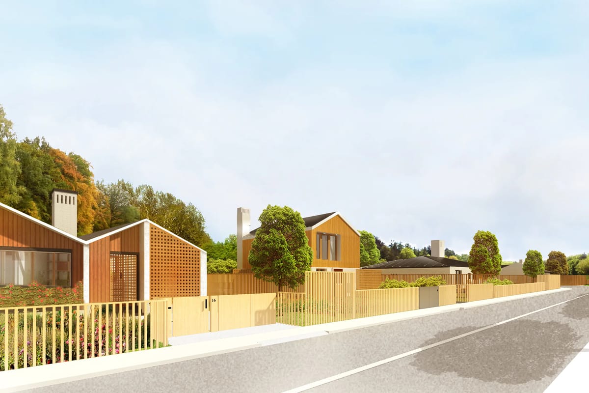Render of timber-clad houses with chimneys behind wooden fences along a village road