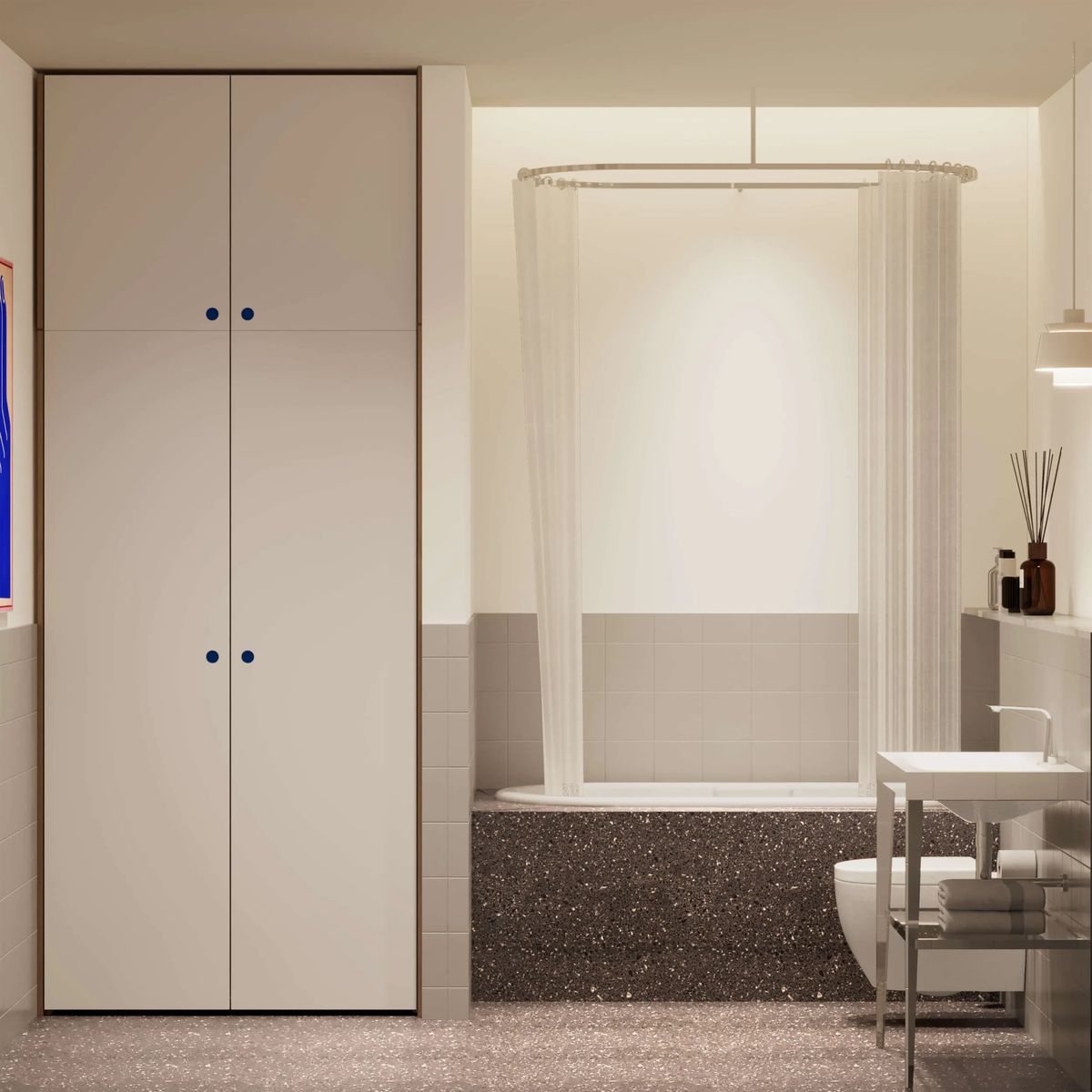 Bathroom with tall white cupboards, a terrazzo-clad bathtub behind a sheer curtain and a steel washstand