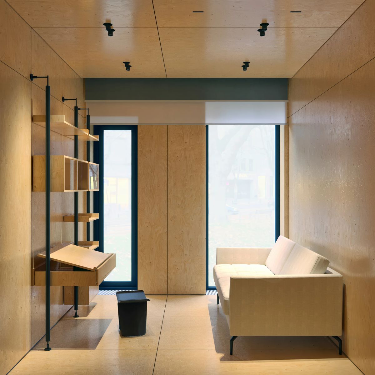 Render of the plywood study facing two tall windows, with a white sofa and wall shelving